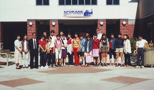 A group of exchange students from Nishinomiya, Japan standing in front of the Spokane Airport.