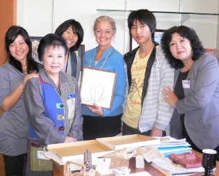 Mayor Atsumi Misako with three Students.